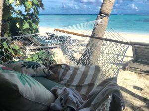 Beach hammock view Pacific Resort Aitutaki Cook Islands