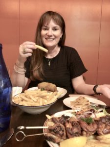 Woman with gluten free options in Stalactites restaurant melbourne
