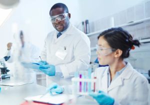 scientists investigating causes of coeliac diseasein lab